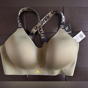 Ivy Park x Peloton x adidas cross back bra with fastener at the back.